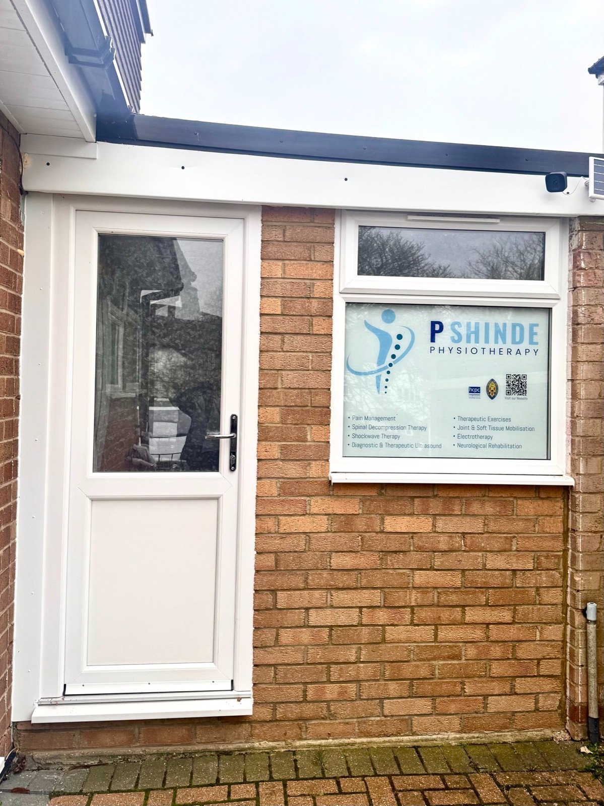 Clinic entrance with P Shinde Physiotherapy sign